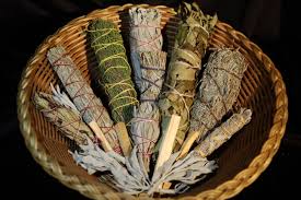 Display of sages used in smudging, blessing, cleansing